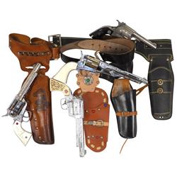 Toy cap guns & holsters (4), all single leather holsters w/Nichols Mustang 500, Stallion 45, Colt 45
