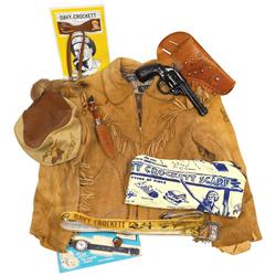 Davy Crocket items, includes metal clicker gun & holster, toy watch (broken band), outfit, raccoon h