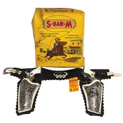 Toy cap guns & holsters, King of the Wild West double holster & 2 Western cap guns in S-Bar-M holste