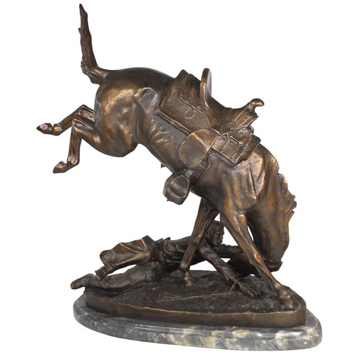 Frederick Remington bronze statue on marble base, rearing horse w/rider