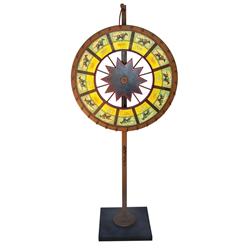 Race horse gaming wheel on display base, features Man O' War, Sea Biscuit & other famous race horses