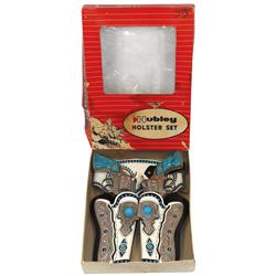 Toy cap gun & holster set by Hubley, baby blue & white w/a pr of baby blue Western grip cap guns in 