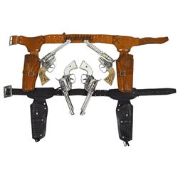 Toy cap guns & holsters, guns are Mattel Fanners, 2 have white grips in double black holster, 2 in b