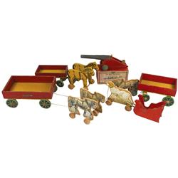 Wooden toys (9), toy cannon in box, wagons, animals & sleigh, most marked Madmar-Utica, New York, VG