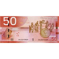 BANK OF CANADA.  $50.00.  2004 Issue.  BC-65a.  (CH-E-15-iii).  A mismatched serial number error, wi