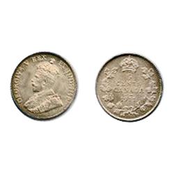 1911.  PCGS graded Mint State-65.  Light rainbow toning.