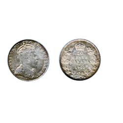 1902-H.  PCGS graded Mint State-63.  Light golden toning with rainbow highlights.