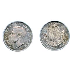 1949. Hoof over ‘9’ variety.  PCGS graded Mint State-63.  Light to medium heavy toning.