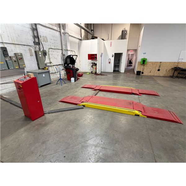 L2 - Challenger Car Lift - 7,700lb. Capacity - Model #: DX77 - Bidder Responsible for Removal  - Tes