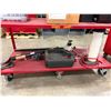 Image 1 : L2 - Contents of Shelves -  Oil Drain Pan, Pneumatic Fluid Evacuator, Bleeder, Tesla Parts, Etc.