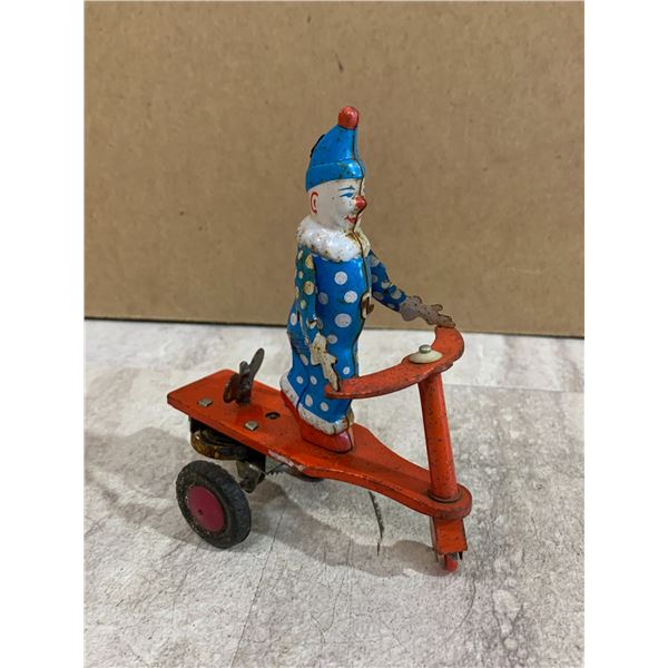 Clown On A Bicycle - Windup Toy
