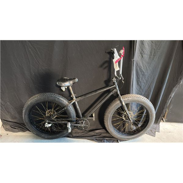 A FRAME 7 SPEED FAT TIRE BLACK BICYCLE