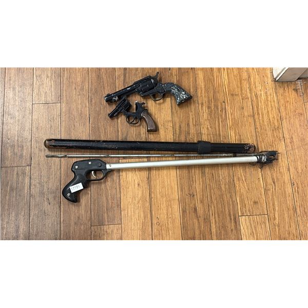ASSORTED WEAPONS; BATON, SPEAR GUN, STARTER PISTOL, CROSMAN SINGLE ACTION 6 CO2 REVOLVER (REQUIRES
