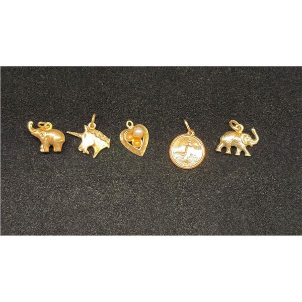 FIVE APPROX 10K+ CHARMS (5.3G)