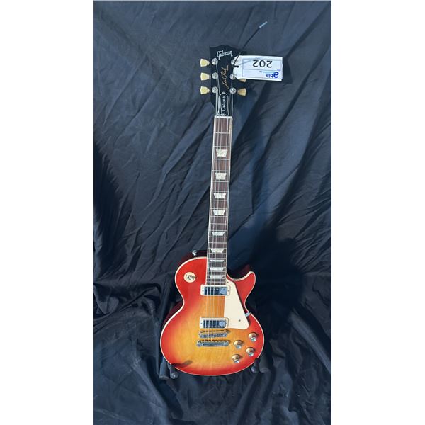 GIBSON LES PAUL DELUX CHERRY SUNBURST, VINTAGE KEYSTONE TURNERS, INDIAN ROSEWOOD FINGERBOARD, CREAM
