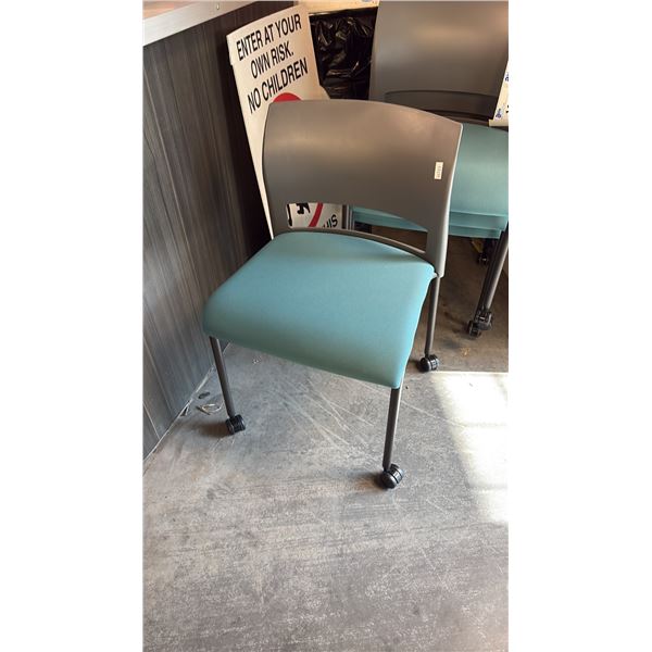 TEAL STEEL CASE MOVE MOBILE STACKING CHAIR