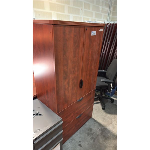 CHERRY FINISH UPPER 2-DOOR CABINET WITH ADJUSTABLE SHELVES. LOWER 2-DRAWER LEGAL/LETTER