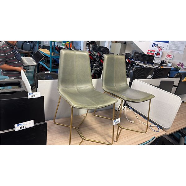 PAIR OF OLIVE GREEN SLOPE FAUX LEATHER DINING CHAIRS