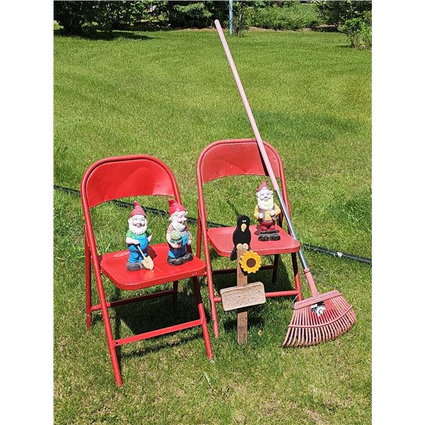 Red Folding Chairs, Three Garden Gnomes, Rake, and Garden Decor Sign