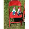 Image 3 : Red Folding Chairs, Three Garden Gnomes, Rake, and Garden Decor Sign