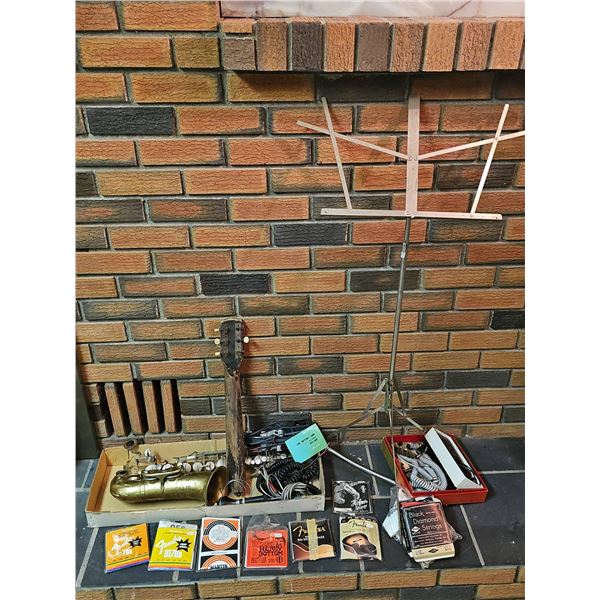 Lot: Saxophone, Guitar Neck, Microphone, Music Stand, Strings