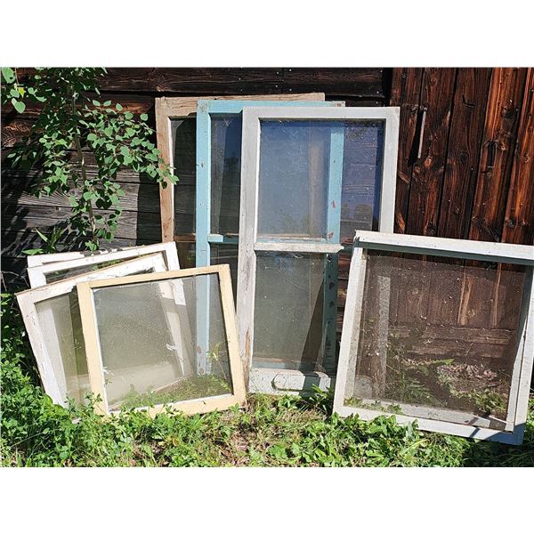 Old Wooden Window Frames with Glass and Screens