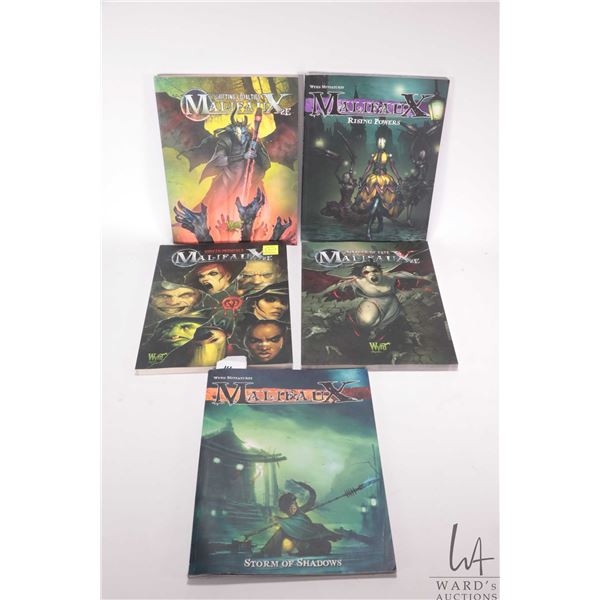 Five Malifaux gaming books including Storm of Shadows, Ripples of Fate, Broken Promises, Rising Powe