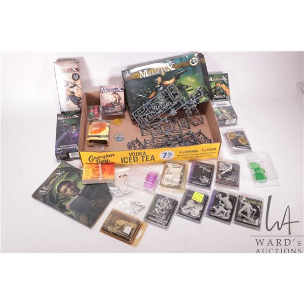 Tray lot of Malifaux gaming pieces including paintable plastic and metal gaming figures, boxed cards