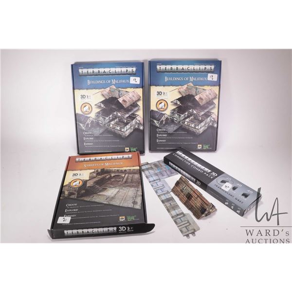 Three boxed sets for Malifaux inlcuding two Buildings of Malifaux and one Streets of Malifaux plus a