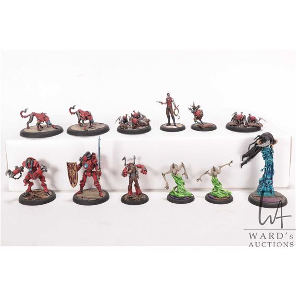 Twelve painted tabletop war gaming figures, possibly Malifaux, but not confirmed.