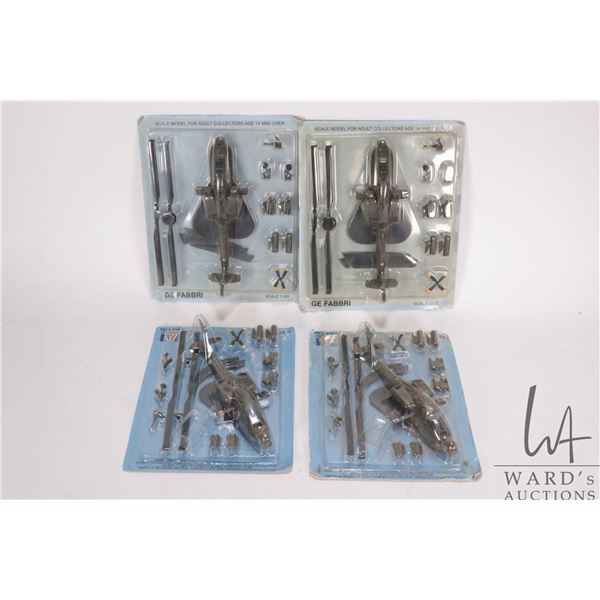 Four scale model miniature helicopters