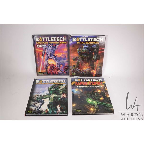 Four hardcover Battletech gaming books including "Alpha Strike Commander's Edition", "Campaign Opera