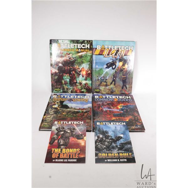 Four hardcover Battletech books including "Dominions Divided", "Tamar Rising", "Ilclan" and " A Batt