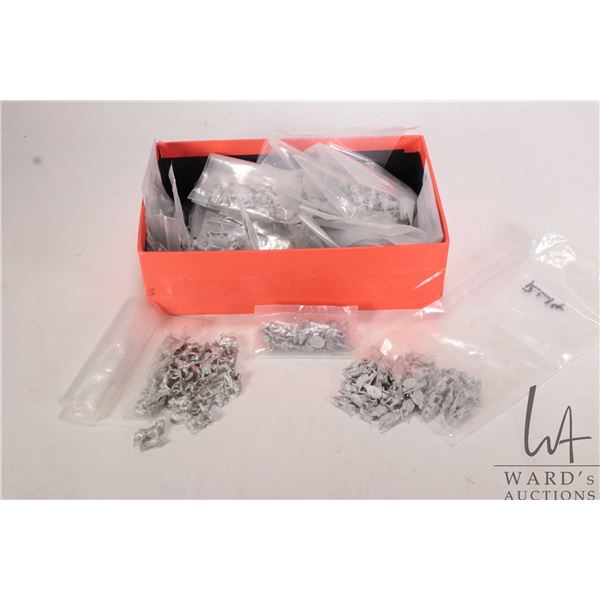 Large selection of metal miniatures including Roman horses, men, riders, weapons etc., approximately