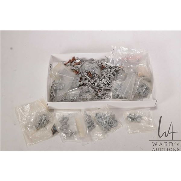 Large selection of metal miniatures including Romans, soldiers, horses, carts, riders etc., approxim