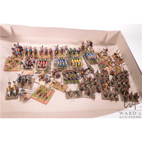 Large selection of what appears to be 15mm Roman chariots and soldier plus Saxons warriors etc. Appr
