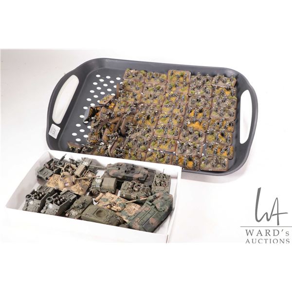 Large selection of what appears to be 15mm WWII military figures and vehicles including tanks, infan