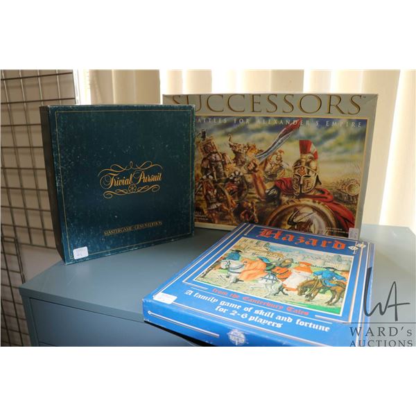 Three board games including " Hazard-from the Cantebrbury Tales", "Trivial Pursuit" and "Successor- 