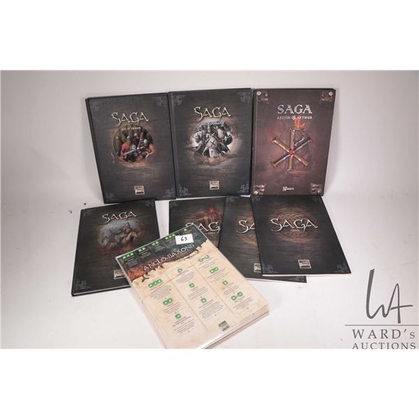 Four hardcover Saga gaming companion books including "Aetius Arthur", "Age of Invasions", "Age of Cr