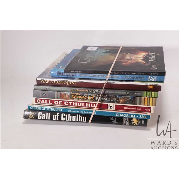 Selection of miniature gaming rule and companion books including "Tainted Grail-The Fall of Avalon",