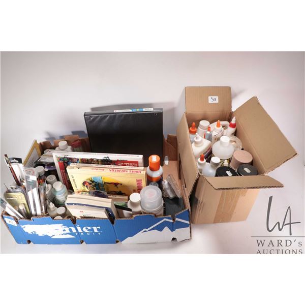 Selection of hobby supplies including paints, brushes, solvents, mixing brushes, "Model Soldiers" il