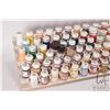 Image 2 : Seven tier paint holder with a large selection of mostly Foundry Paint System acrylic paints, half a