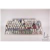 Image 1 : Seven tier paint holder with a large selection of dropper bottle style acrylic paints, mostly Valleg