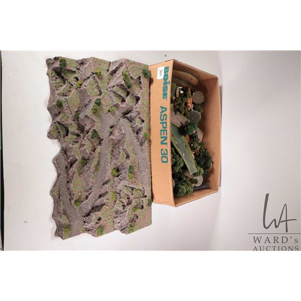 Large selection of wargaming terrain including plants, trees and rock formations etc.