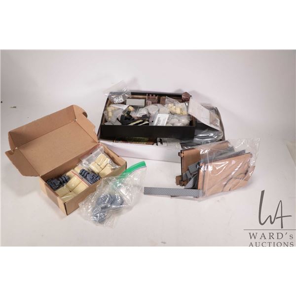 Selection of tabletop gaming buildings including laser cut kits, resin/ plastic components, snap tog