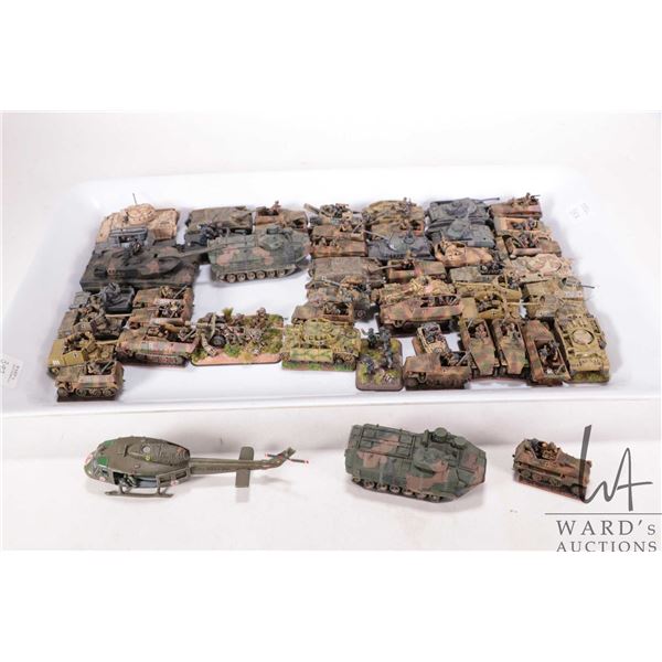 Selection of what appears to be 15mm WWII miniature military vehicles and tanks, all individually an