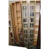 Image 1 : Four DVD and CD shelving units and contents of music CDs