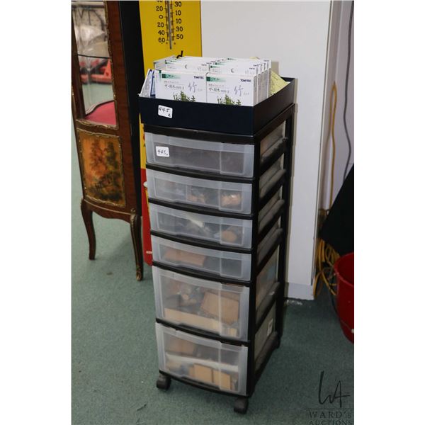 Six drawer rolling storage cart and contents including laser cut wooden gaming bases and magnetic ba