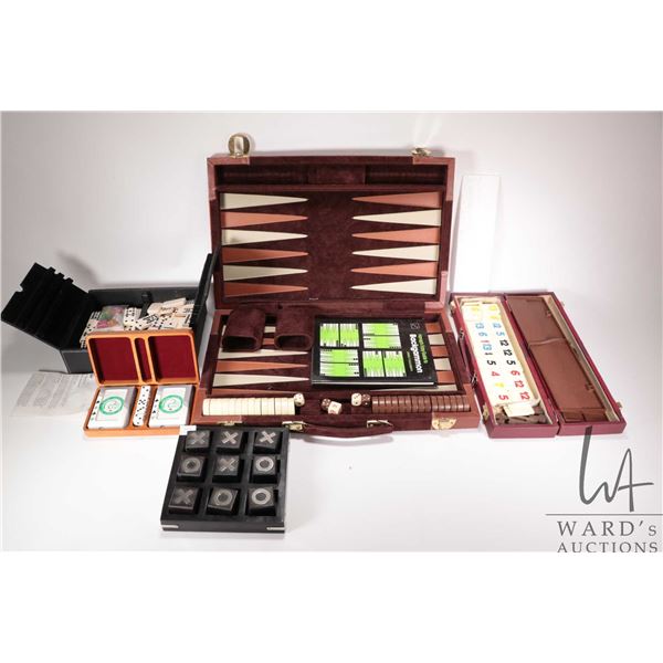 Five assorted board games including Tic-tac-toe, Dominos, Rummy, Backgammon and a Ducks Unlimited di