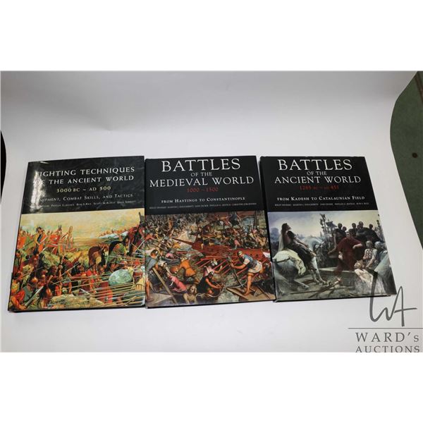 Three hardcover books including " Fighting Techniques of the Ancient World 3000 BC-AD 500: Equipment